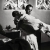 Eugene Smith, В больнице нет лифта и поэтому доктор на руках несет 85-летнего пациента в операционную.